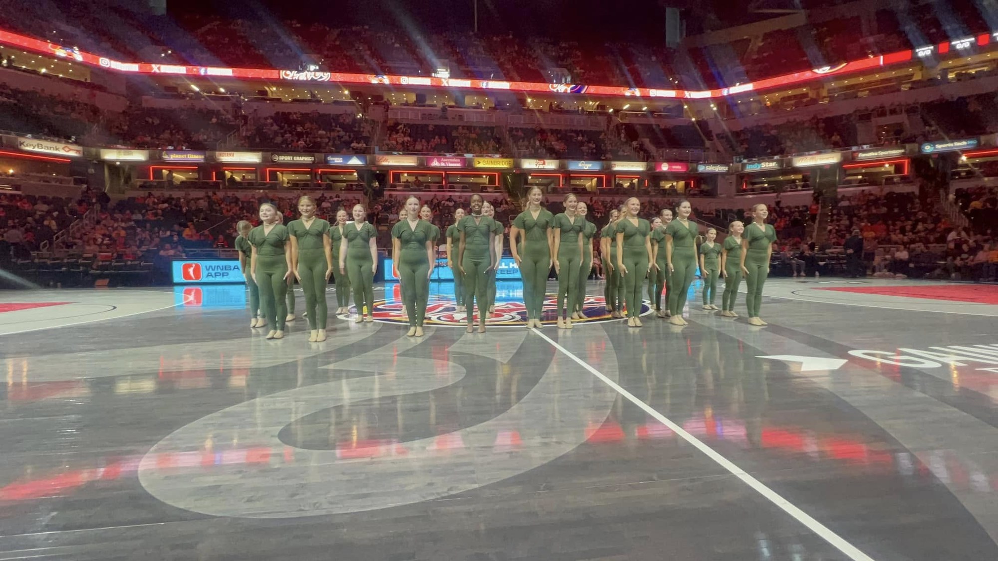 Exclusively Dance dancers performing at an Indiana Fever game